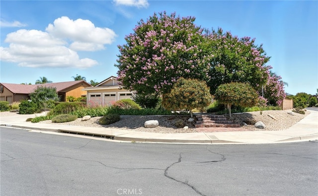 42133 Wagon Wheel Ln, Murrieta, CA 92562 - obstructed view of property with a garage
