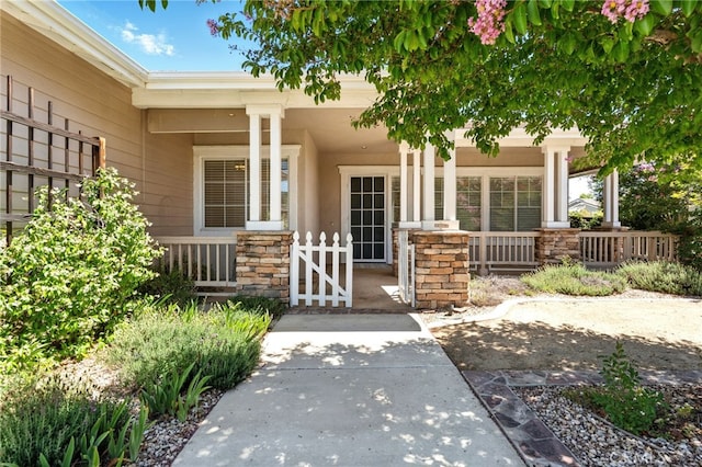 42133 Wagon Wheel Ln, Murrieta, CA 92562 - property entrance with covered porch and stone siding