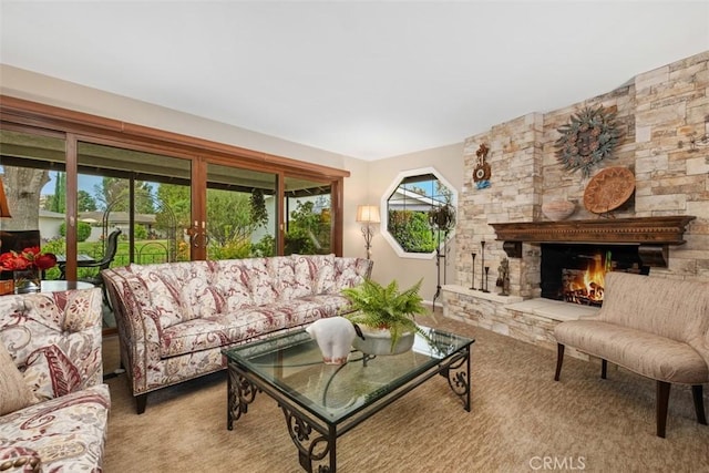 carpeted living room with a fireplace