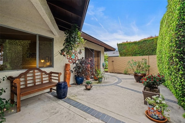 14321 Mimosa Ln, Tustin, CA 92780 - view of patio / terrace featuring fence