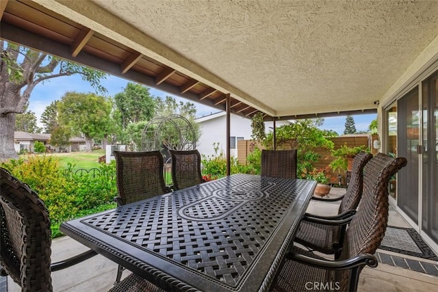 14321 Mimosa Ln, Tustin, CA 92780 - view of patio with outdoor dining space and fence