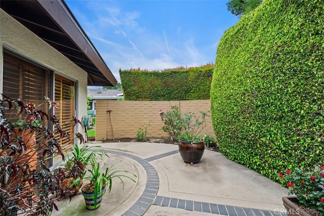 14321 Mimosa Ln, Tustin, CA 92780 - view of patio / terrace with fence