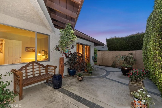 14321 Mimosa Ln, Tustin, CA 92780 - patio terrace at dusk featuring fence