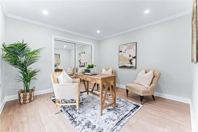 home office featuring light wood-type flooring, baseboards, recessed lighting, and crown molding