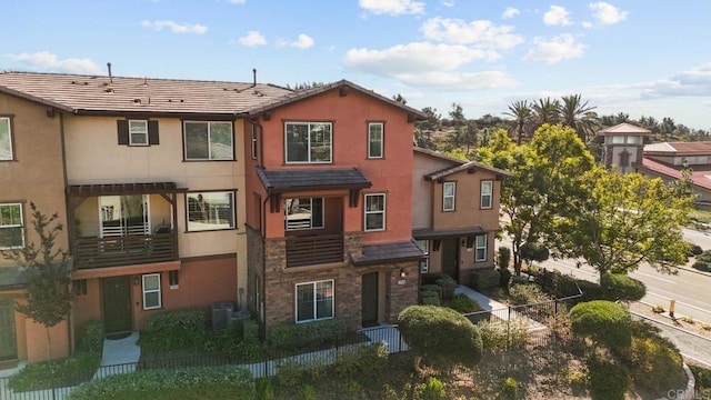 2710 Sparta Rd Unit 10, Chula Vista, CA 91915 - view of front of home featuring stone siding and stucco siding
