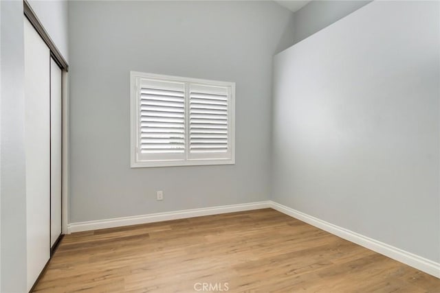 6199 Cabernet Pl, Rancho Cucamonga, CA 91737 - unfurnished bedroom featuring a closet, light wood-style floors, and baseboards