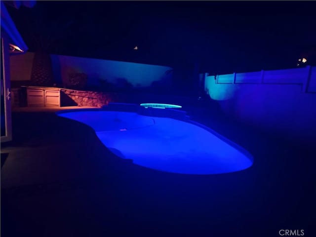 6199 Cabernet Pl, Rancho Cucamonga, CA 91737 - pool at night with a patio area