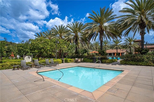 135 Bridle Path, Irvine, CA 92602 - community pool with a patio area
