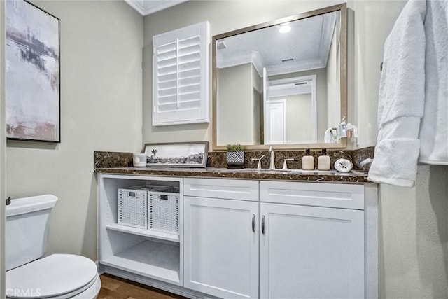 135 Bridle Path, Irvine, CA 92602 - bathroom featuring ornamental molding, toilet, vanity, and wood finished floors