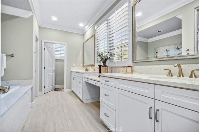 135 Bridle Path, Irvine, CA 92602 - full bathroom with crown molding, vanity, a garden tub, baseboards, and wood finished floors