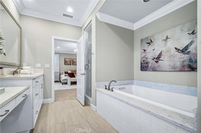 135 Bridle Path, Irvine, CA 92602 - bathroom with ornamental molding, ensuite bath, vanity, a garden tub, and a shower stall