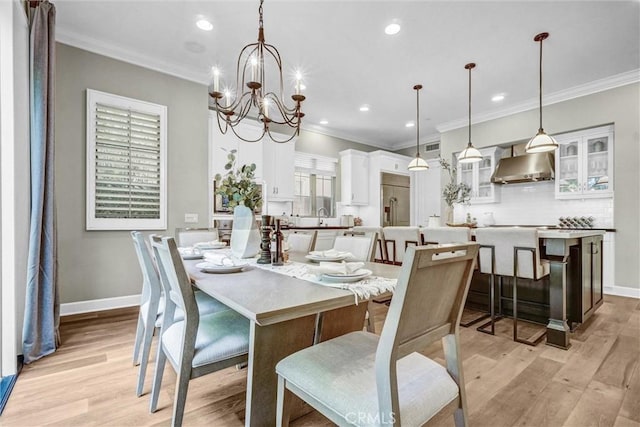 135 Bridle Path, Irvine, CA 92602 - dining area featuring light wood-style floors, ornamental molding, a chandelier, plenty of natural light, and recessed lighting