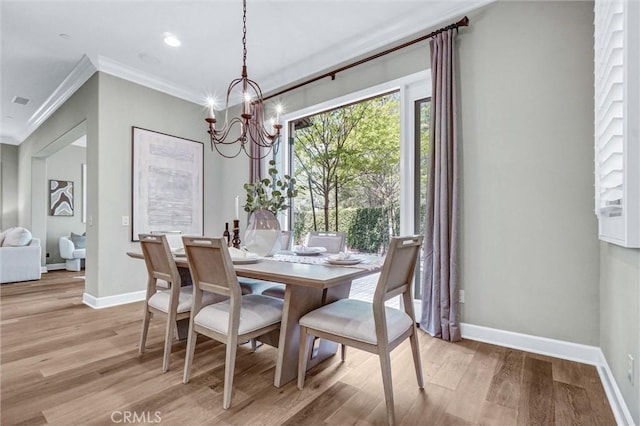 135 Bridle Path, Irvine, CA 92602 - dining area with a chandelier, crown molding, baseboards, light wood finished floors, and recessed lighting