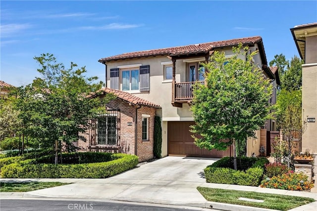 135 Bridle Path, Irvine, CA 92602 - mediterranean / spanish home with a tiled roof, driveway, an attached garage, stucco siding, and a balcony