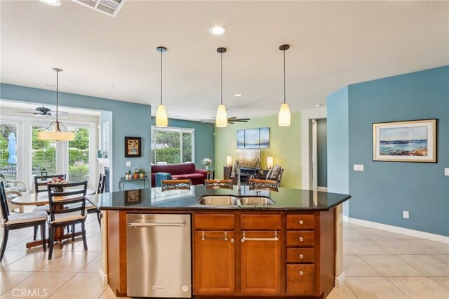 1436 Via Rojas, Hemet, CA 92545 - kitchen with ceiling fan, open floor plan, light tile patterned floors, a kitchen island with sink, and recessed lighting