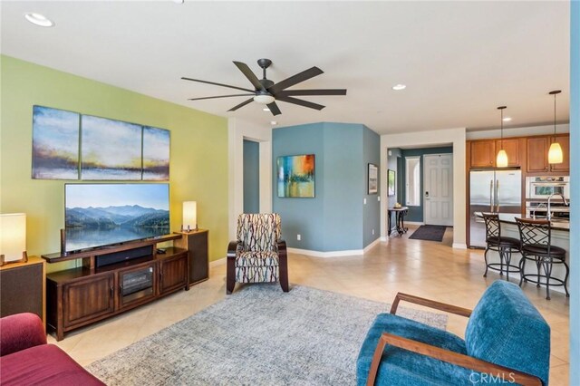 1436 Via Rojas, Hemet, CA 92545 - living area featuring light tile patterned floors, a ceiling fan, recessed lighting, and baseboards