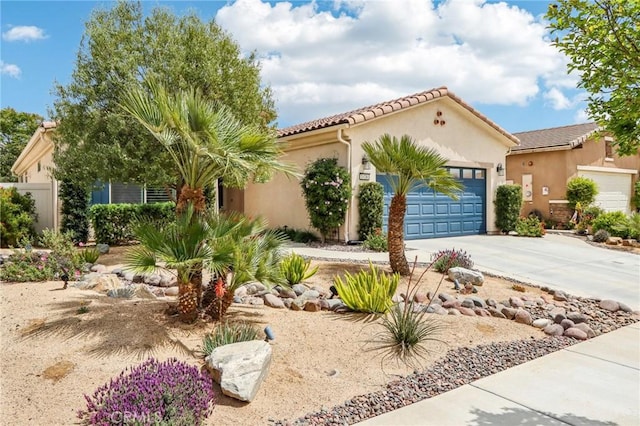1436 Via Rojas, Hemet, CA 92545 - mediterranean / spanish home with a garage, concrete driveway, stucco siding, and a tile roof