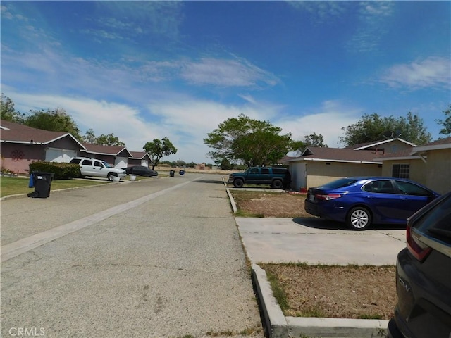 38625 25th St E, Palmdale, CA 93550 - view of asphalt road with a residential view