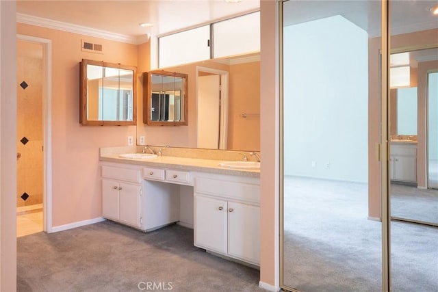 303 Calle Escuela, San Clemente, CA 92672 - full bathroom with ornamental molding, a shower, double vanity, baseboards, and carpet flooring
