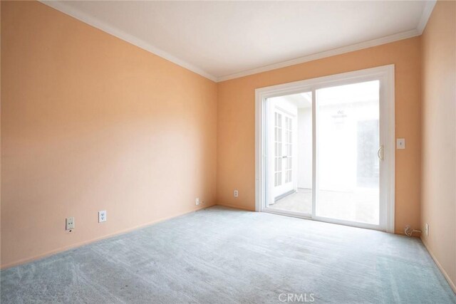 303 Calle Escuela, San Clemente, CA 92672 - carpeted spare room featuring crown molding and baseboards