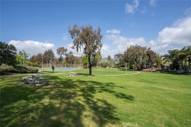 surrounding community with a lawn