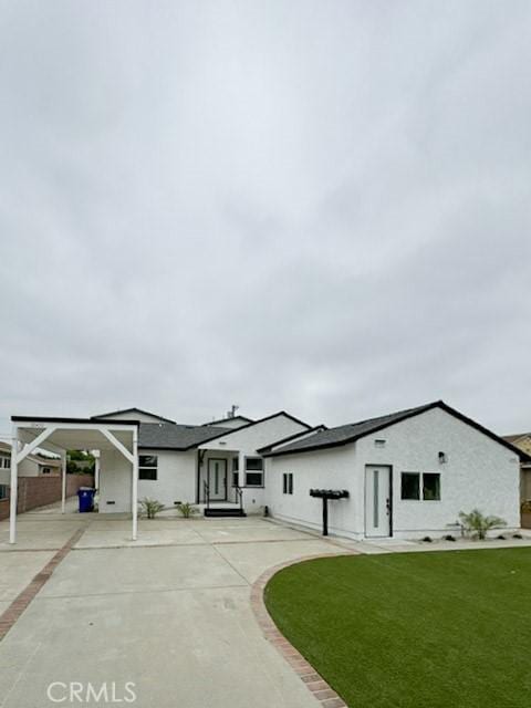 10430 Densmore Ave, Granada Hills, CA 91344 - view of front of home featuring a front yard and stucco siding