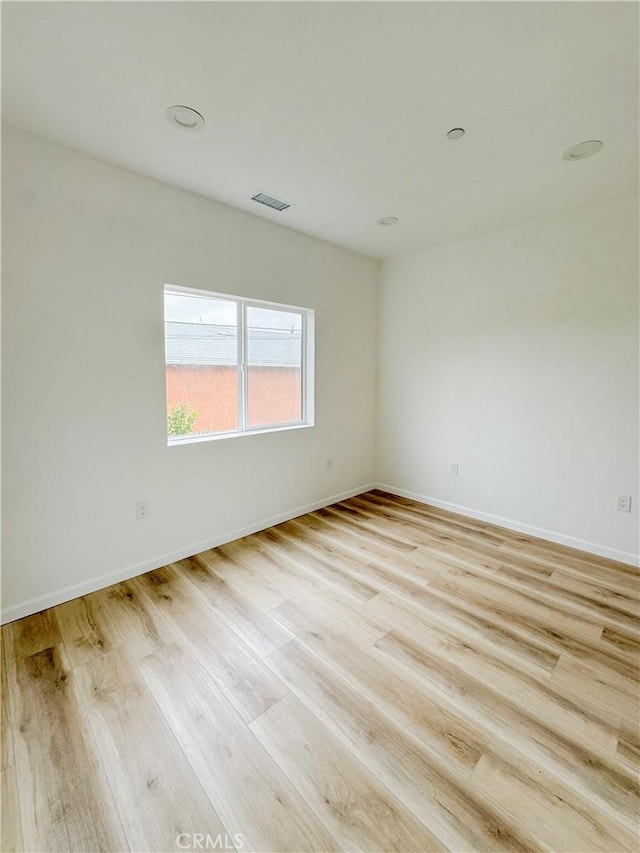10430 Densmore Ave, Granada Hills, CA 91344 - spare room with light wood-style floors and baseboards