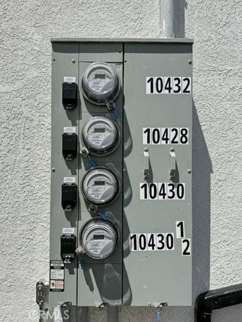 10430 Densmore Ave, Granada Hills, CA 91344 - exterior view of electric meter and stucco siding