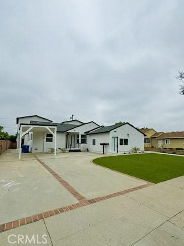 10430 Densmore Ave, Granada Hills, CA 91344 - view of front facade featuring a front yard