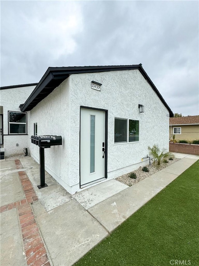 10430 Densmore Ave, Granada Hills, CA 91344 - back of property featuring stucco siding