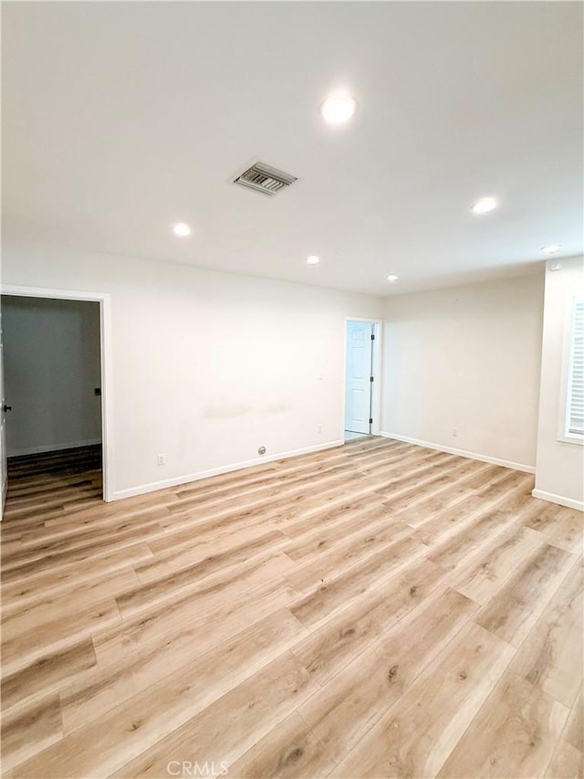 10430 Densmore Ave, Granada Hills, CA 91344 - empty room with recessed lighting, light wood-style floors, and baseboards
