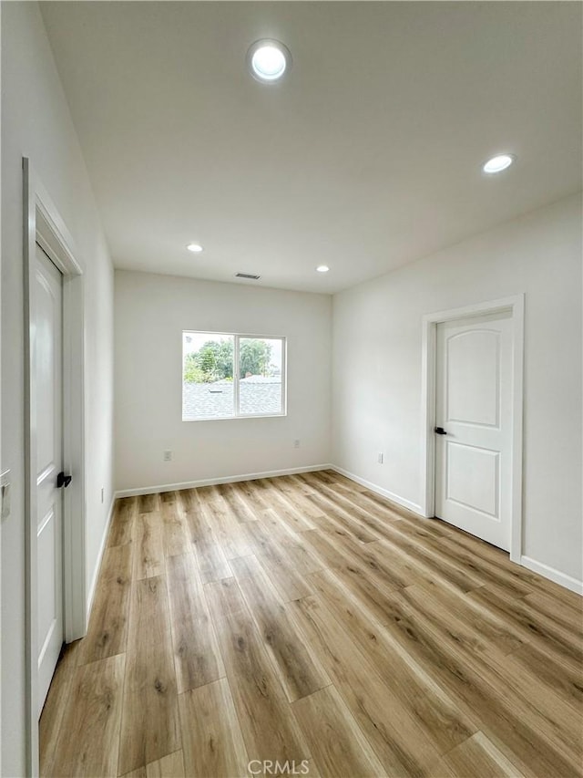 10430 Densmore Ave, Granada Hills, CA 91344 - unfurnished room featuring light wood-style floors, recessed lighting, and baseboards