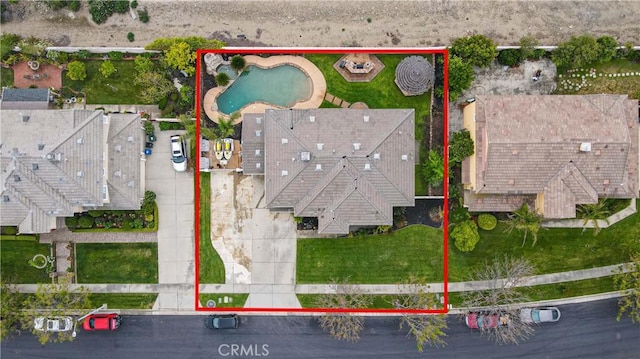 aerial view of property's location featuring property boundaries highlighted and a pool