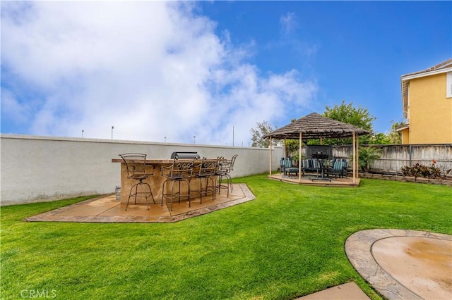 view of yard featuring a gazebo and a patio