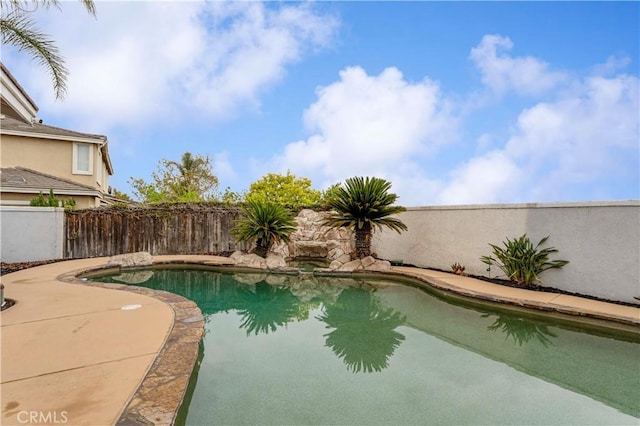 view of pool featuring a fenced backyard