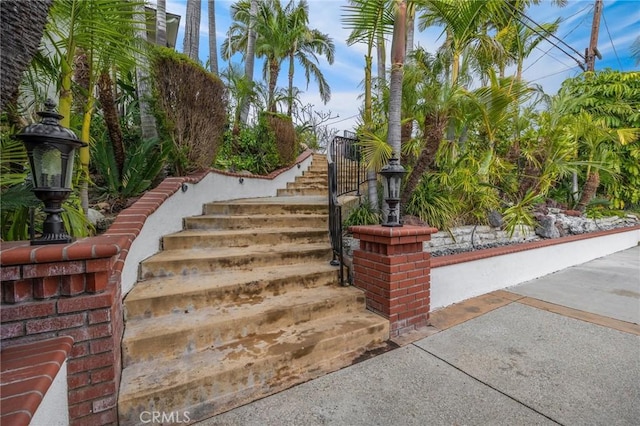 view of home's community with stairs
