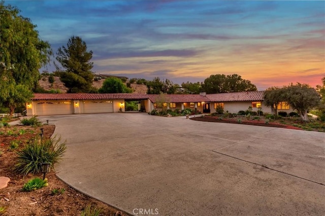 37895 Avenida Bravura, Temecula, CA 92592 - view of front of house with driveway, stucco siding, and a tiled roof