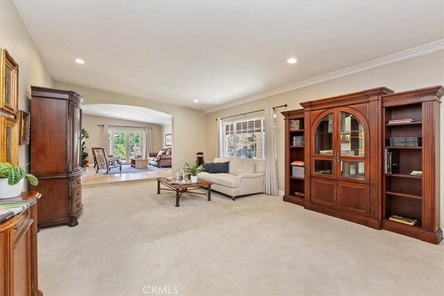 37895 Avenida Bravura, Temecula, CA 92592 - carpeted living area featuring arched walkways, recessed lighting, and ornamental molding