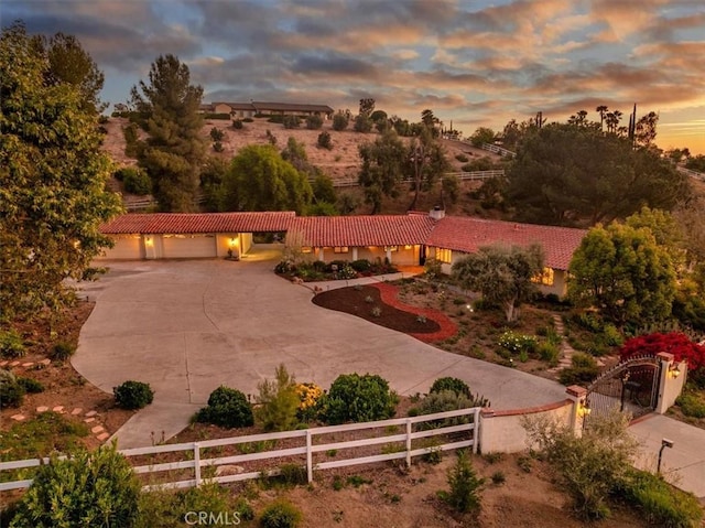 37895 Avenida Bravura, Temecula, CA 92592 - view of front of home featuring a tiled roof, driveway, stucco siding, and a garage