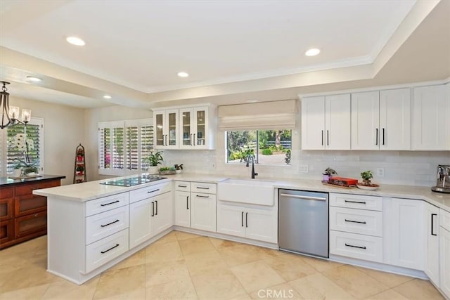 37895 Avenida Bravura, Temecula, CA 92592 - kitchen with dishwasher, black electric stovetop, a peninsula, tasteful backsplash, and light countertops