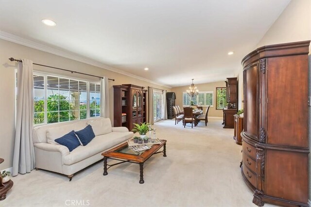37895 Avenida Bravura, Temecula, CA 92592 - living area with a chandelier, light colored carpet, recessed lighting, and crown molding