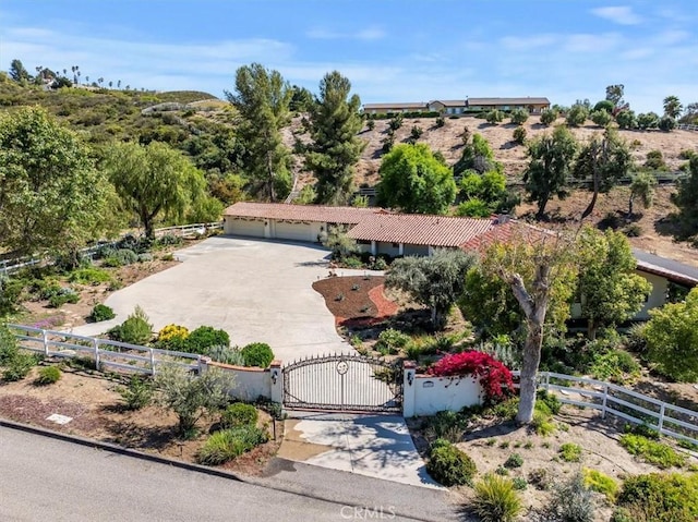 37895 Avenida Bravura, Temecula, CA 92592 - view of front of house with a fenced front yard, a gate, and concrete driveway
