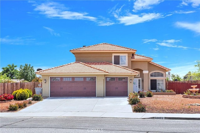 15199 Farmington Ct, Hesperia, CA 92345 - view of front facade featuring fence, stucco siding, an attached garage, and driveway