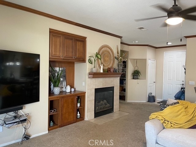 124 Lighthouse Ct, San Jacinto, CA 92583 - carpeted living area with a ceiling fan, a fireplace, baseboards, and crown molding