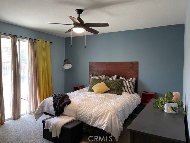 124 Lighthouse Ct, San Jacinto, CA 92583 - carpeted bedroom with ceiling fan