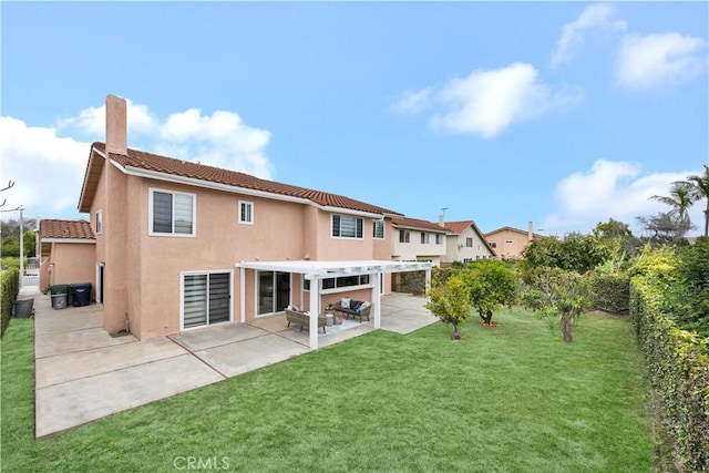 rear view of property with a tile roof, stucco siding, a pergola, a chimney, and a patio