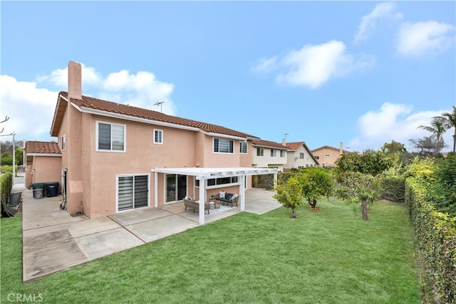 rear view of property with a tile roof, stucco siding, a chimney, a pergola, and a patio