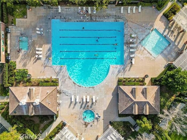 drone / aerial view of a pool