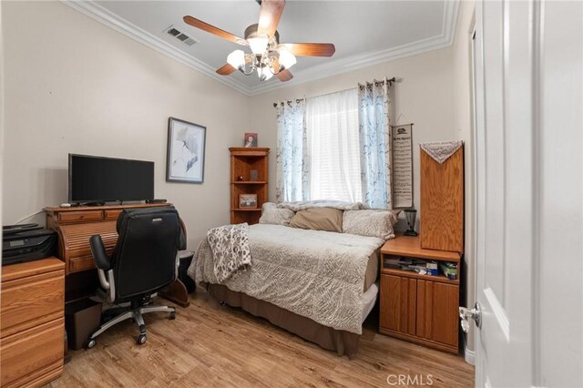19536 Cherrydale Ct, Apple Valley, CA 92308 - bedroom with crown molding, light wood-type flooring, a desk, and ceiling fan