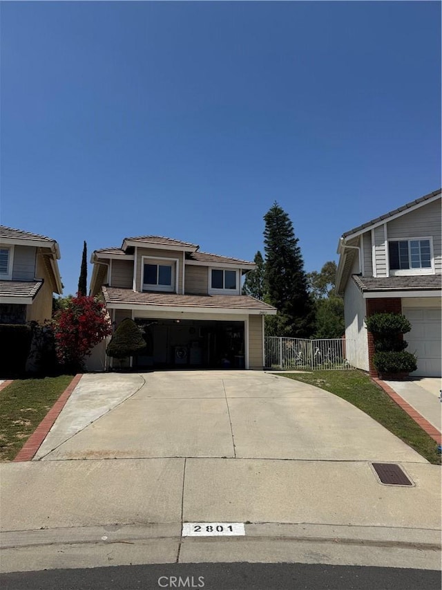 2801 Woodview Ct, Walnut, CA 91789 - view of front of house featuring an attached garage and concrete driveway